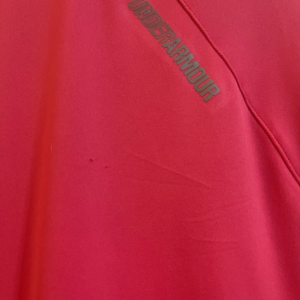 Women’s Under Armour 3/4 zipper long sleeved heat gear shirt. Size large.